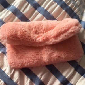 Faux fur pink clutch